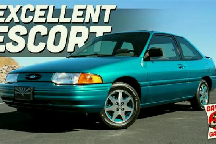escort Touza